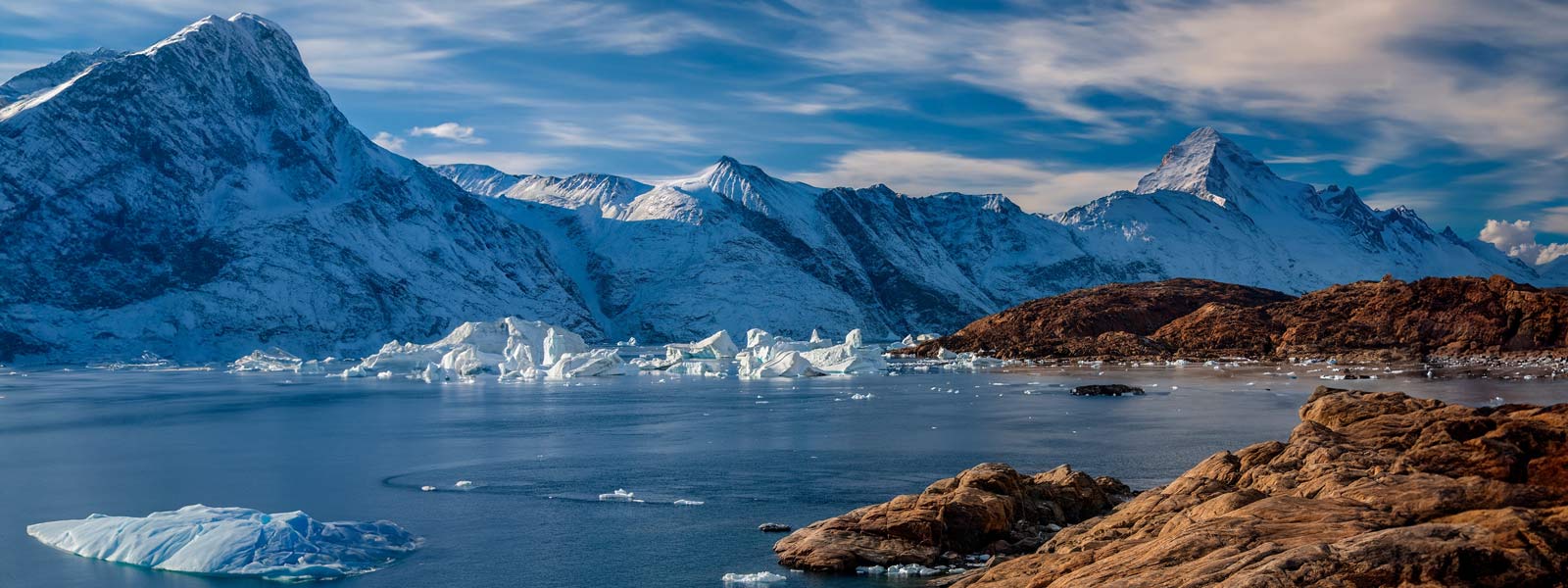 Greenland_Fjord-in-Scoresbysund-hero_WG Greenland_Fjord-in-Scoresbysund-hero_WG