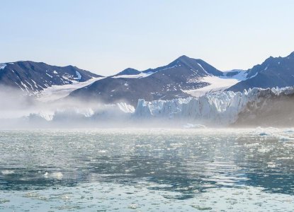Monacobreen Glacier in icy bay in Arctic Svalbard