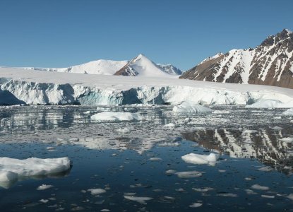 Mirror image of ice and mountains in Antarctica onboard Ocean Nova expedition cruise