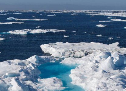 Icebergs floating in dark blue waters of Lancaster Sound in Northwest Passage in the Arctic